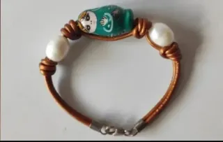 Pulseras plata y cordón