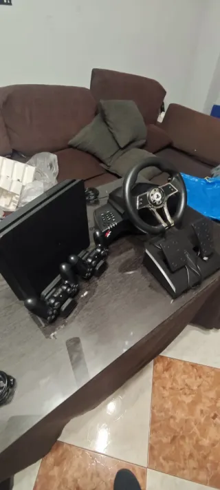 PS4+2mandos+base refrigerante+volante+pedales