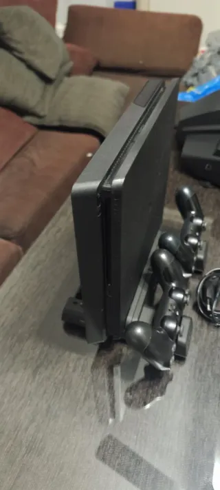 PS4+2mandos+base refrigerante+volante+pedales