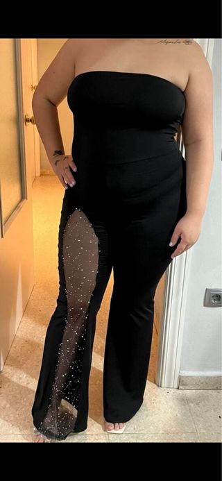 Mono negro con pierna transparente y pedrería