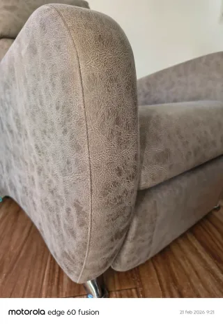 Sillón reclinable gris tela