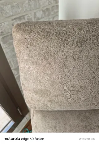 Sillón reclinable gris tela