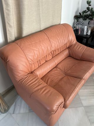 Sofá de piel naranja/marrón