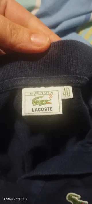 Polo sin mangas Lacoste azul marino