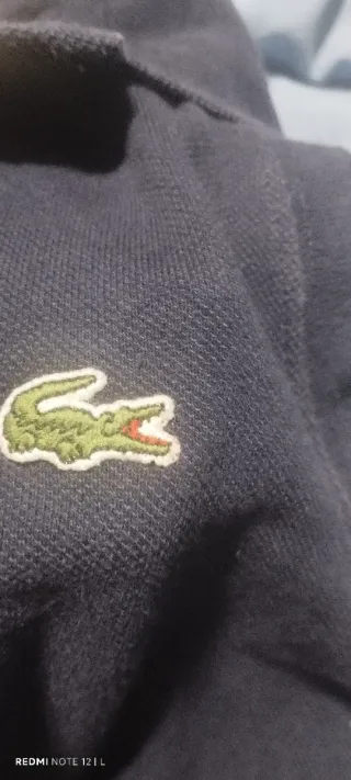 Polo sin mangas Lacoste azul marino