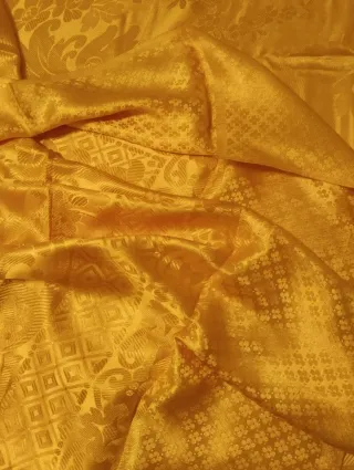 Cubre cama dorado de diseño