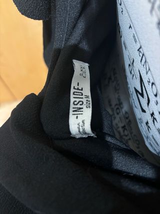 Vestido negro con volantes