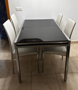 Mesa cristal negro y 4 sillas polipiel