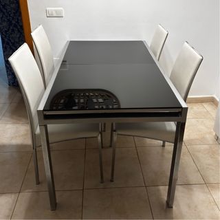 Mesa cristal negro y 4 sillas polipiel