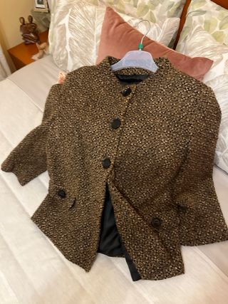 Chaqueta tweed negra y dorada