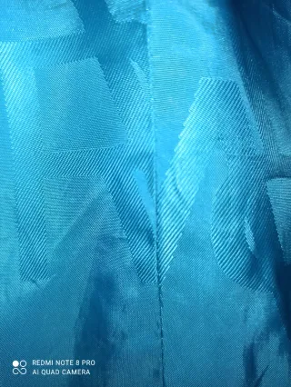 Chaqueta corta Roberto Verino azul y dorada