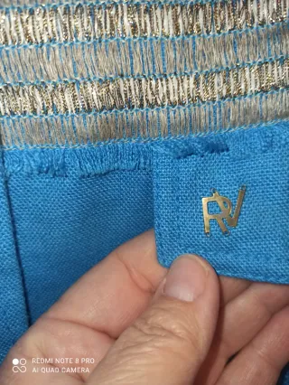 Chaqueta corta Roberto Verino azul y dorada