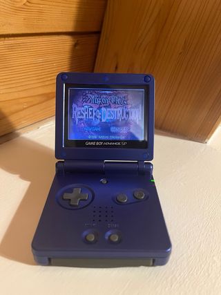 Game Boy Advance SP Blu + Yu-Gi-Oh! + Caricatore