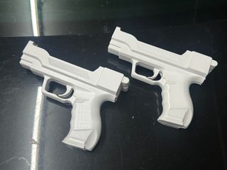 2 Pistolas para mandos Nintendo Wii