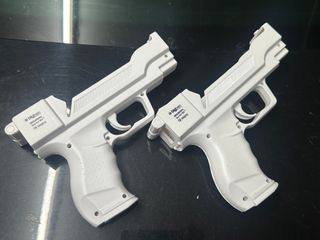 2 Pistolas para mandos Nintendo Wii