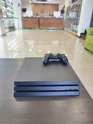 PS4 Pro + DualShock Negro Seminuevo