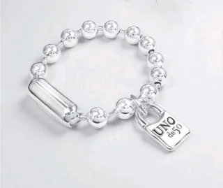 Pulsera UNOde50 Bolitas Charm Candado Plata