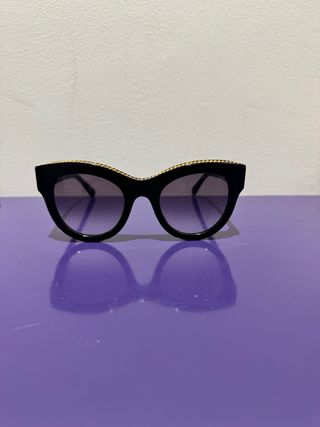 Occhiali da sole Stella McCartney neri e oro
