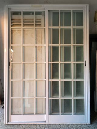 Balconera corredera cuarterón