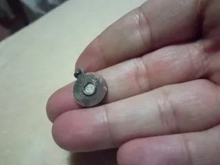 Colgante antiguo con rostro,de Santa Gema plata