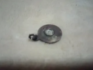 Colgante antiguo con rostro,de Santa Gema plata