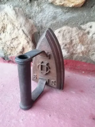 Plancha antigua de hierro