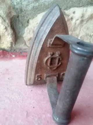 Plancha antigua de hierro