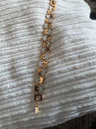 Pulsera Swarovski dorada con piedras