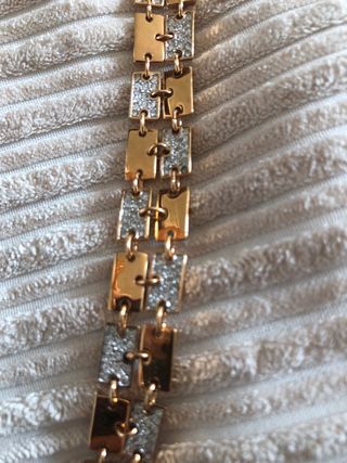 Pulsera Swarovski dorada con piedras