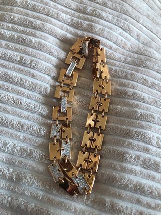 Pulsera Swarovski dorada con piedras