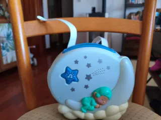 Lote proyector musical y sonajero