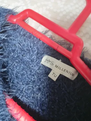 Jersey azul de punto con lazos