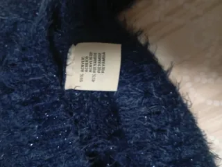 Jersey azul de punto con lazos