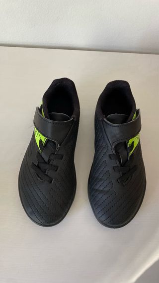 Botas fútbol multitacos niño