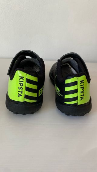 Botas fútbol multitacos niño