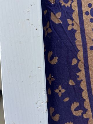 Cama doble con cabecero blanco