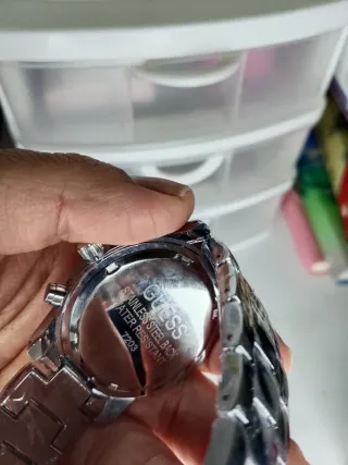 Reloj plateado nuevo precintado