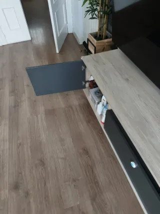 Mueble de salón con mesa elevable