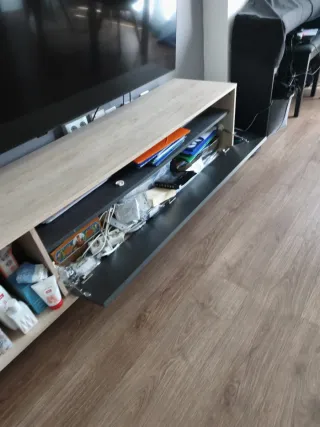 Mueble de salón con mesa elevable