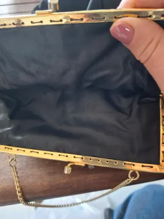 Pochette elegante con paillettes nere