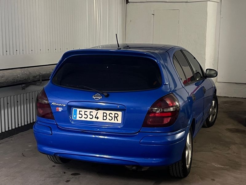 Nissan Almera 2001 cambio por moto - foto 1