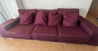 Sofá modular morado con puff