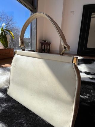 Bolso de mano vintage con motivos florales. 1960