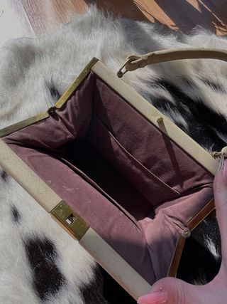 Bolso de mano vintage con motivos florales. 1960