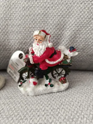 3 Figuras Papá Noel en Bicicleta