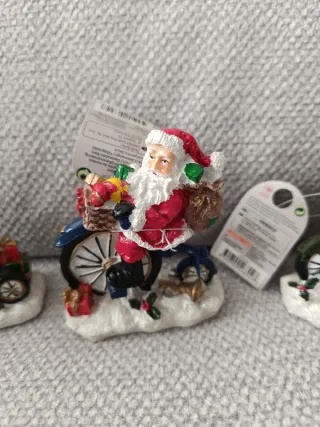 3 Figuras Papá Noel en Bicicleta