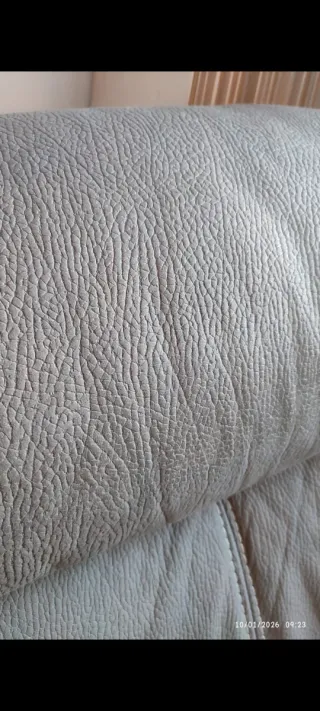 Sillón reclinable de piel gris