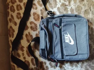 Bandolera /riñonera /mochilita Nike Gris