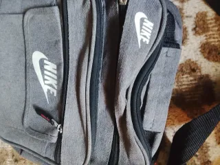 Bandolera /riñonera /mochilita Nike Gris