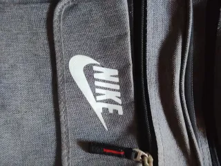 Bandolera /riñonera /mochilita Nike Gris